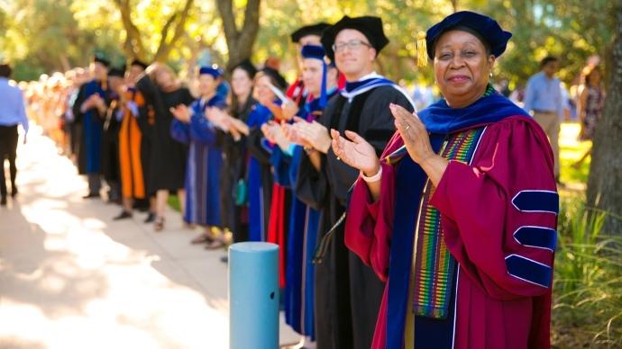 Deneese Jones claps at convocation